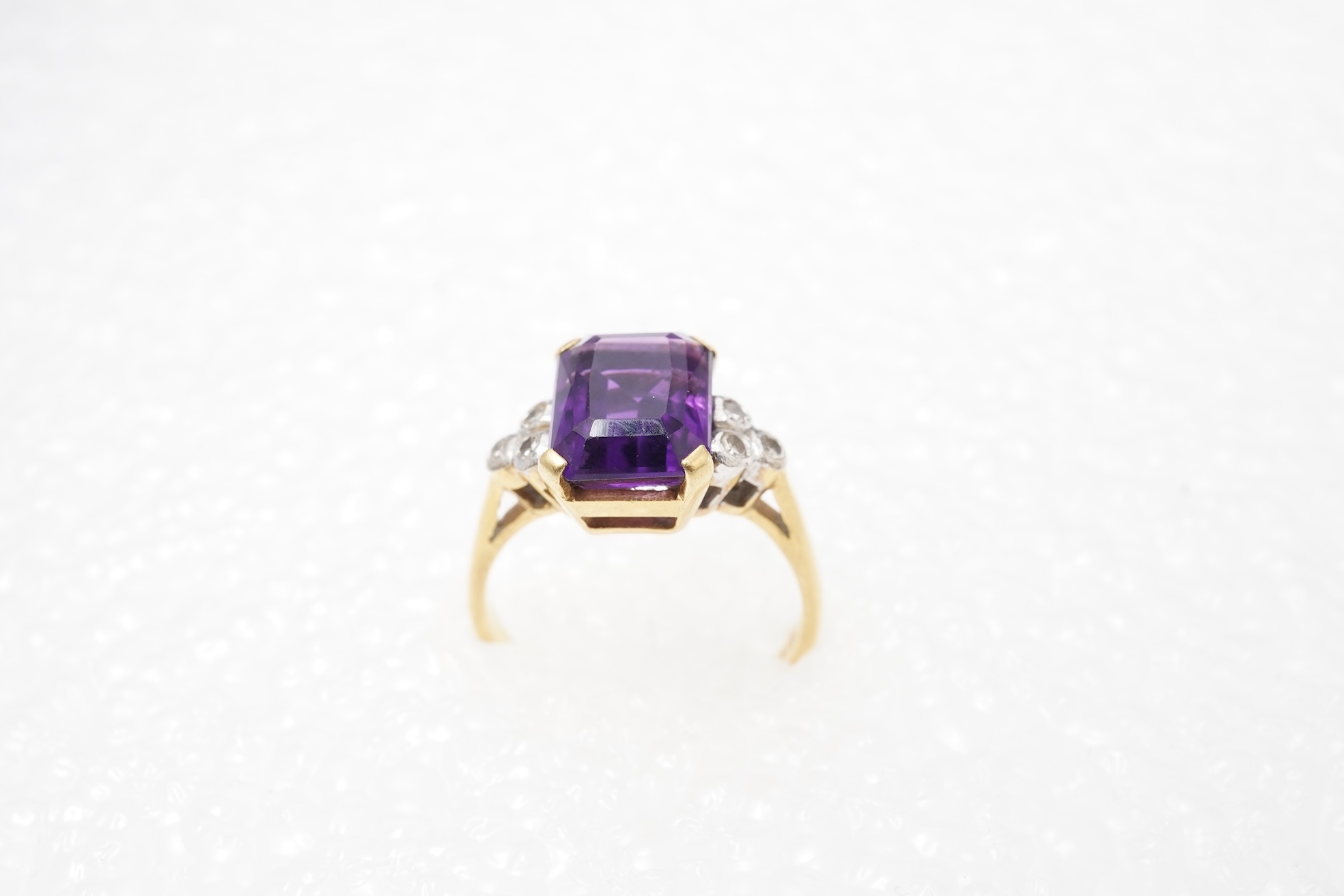 An amethyst and diamond ring